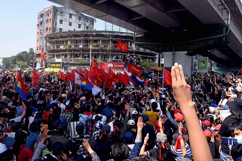 Protesters participate in an anti military rally Image VOA Burmese