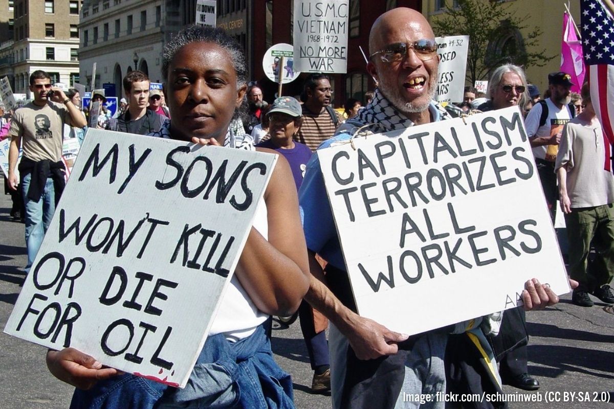 iraq war protest placards