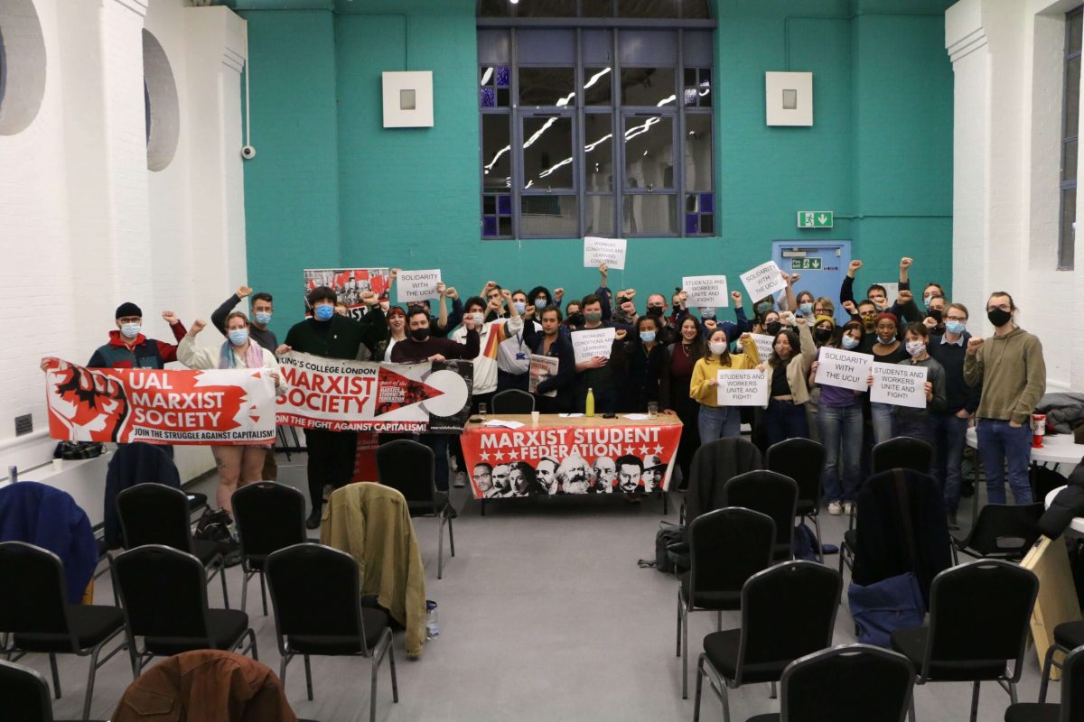 Marxist students stand shoulder-to-shoulder with striking staff