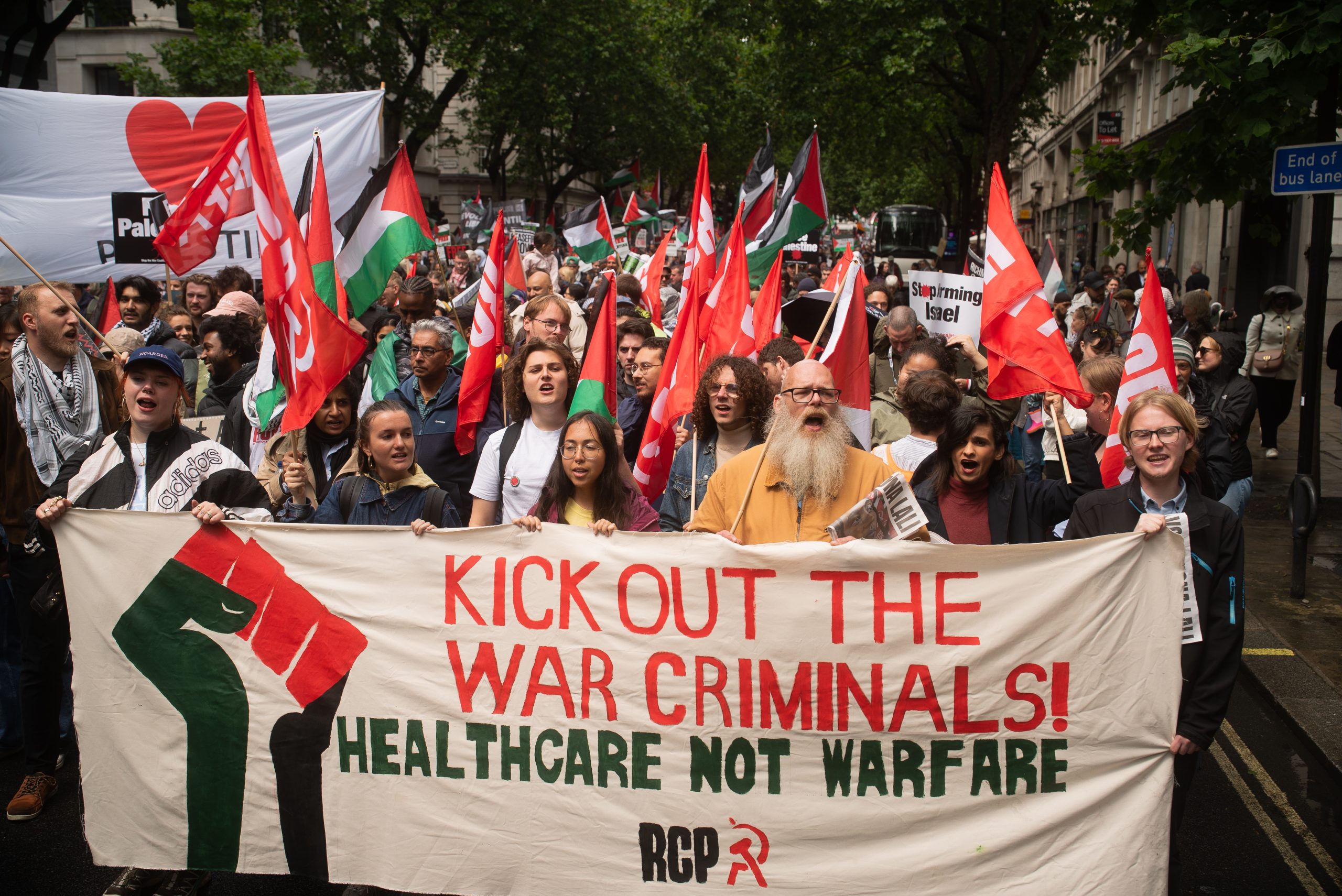 Kick out the war criminals banner RCP