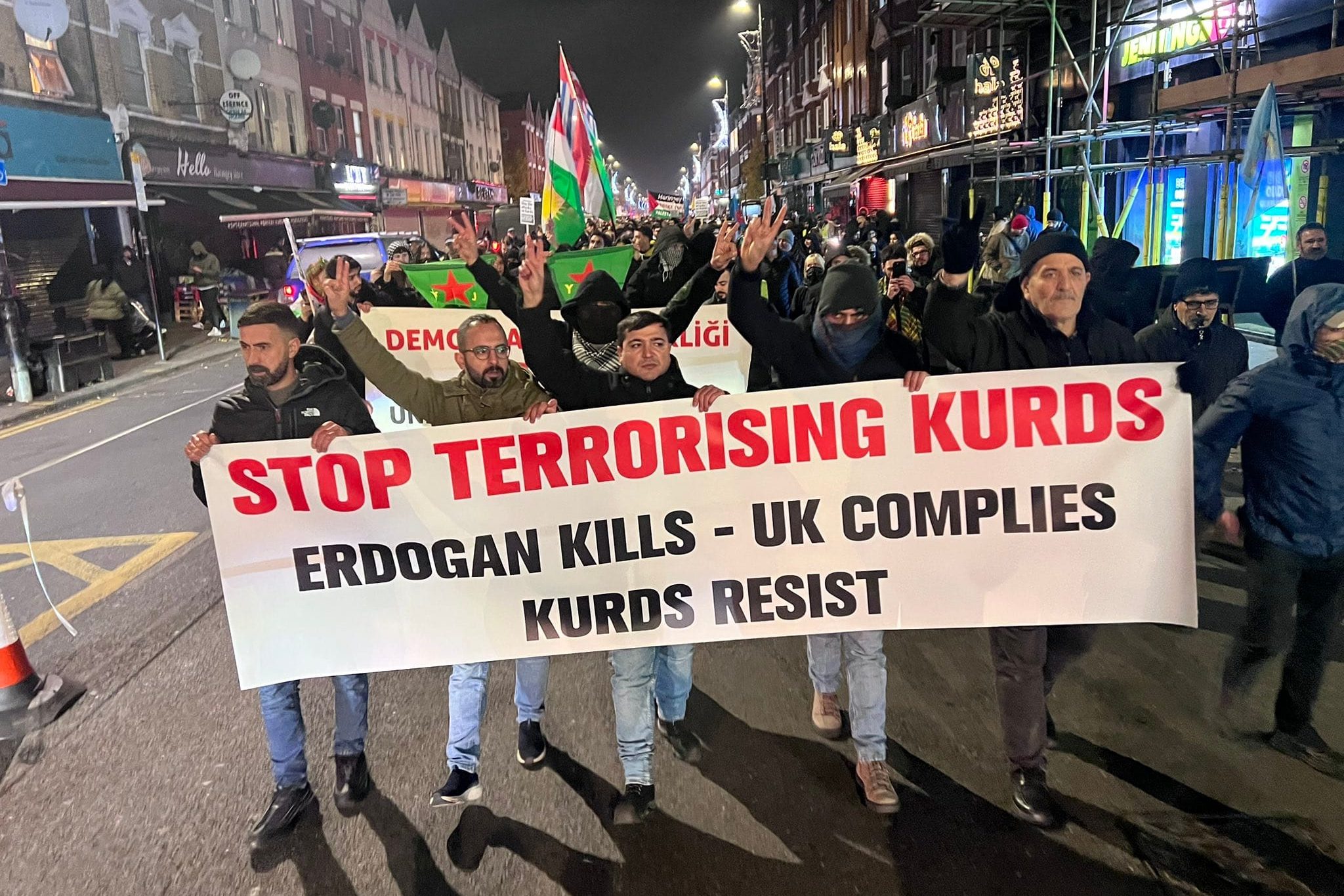 Stop terrorising kurds banner