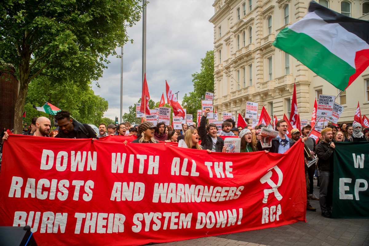 RCP down with racists and warmongers banner