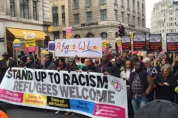 SUTR refugees welcome banner